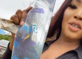 “Maybe na river water” — Speculations as lady flaunts N10 ‘pure water’ in Benin