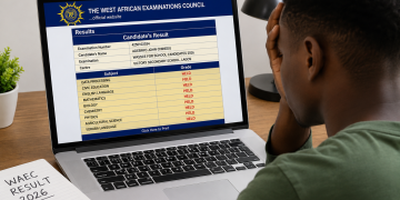 What to Do When You See "HELD" on Your 2026 WAEC Result (Complete Guide) 16 "Student checking 2026 WAEC result showing HELD on screen."